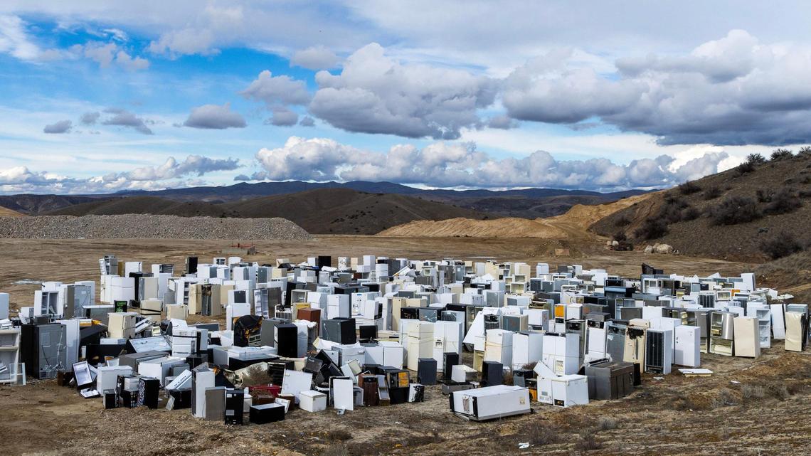 An ominous-looking graveyard of disposed refrigerators is set aside from other landfill drop offs at the Ada County Landfill.