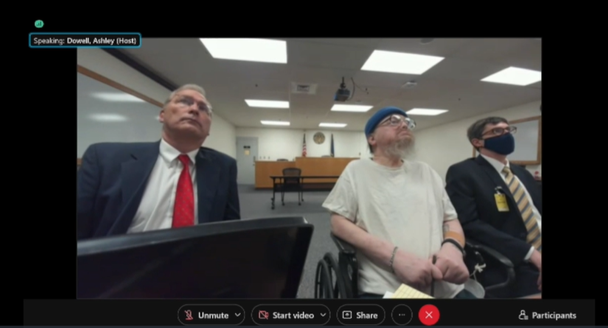 Death row prisoner Gerald Pizzuto, center, attends a clemency hearing in November 2021 with members of his legal team from the nonprofit Federal Defender Services of Idaho. Pizzuto, now 70, is the second-oldest member of Idaho’s death row.