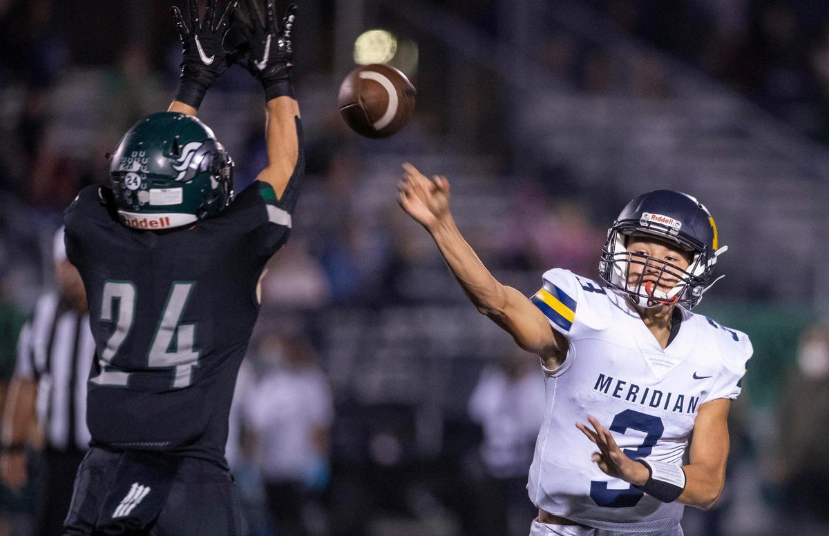 Meridian quarterback Malakai Martinez was the fourth-leading passer in 5A last season.