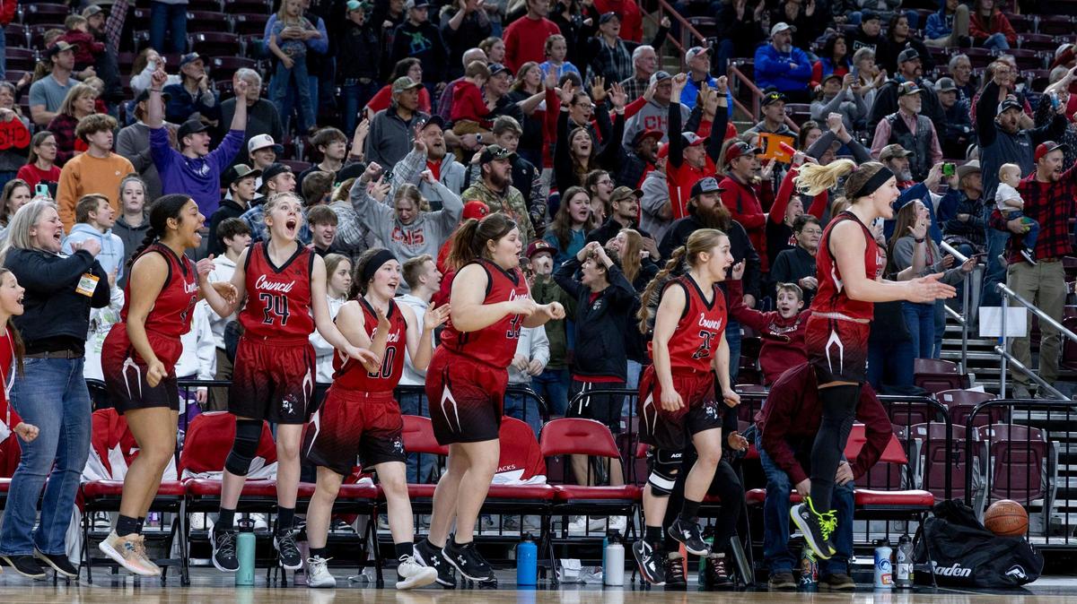 Council erupts off the bench at the buzzer after a 52-42 win over Dietrich in the 1A Division II girls basketball state championship Saturday at the Ford Idaho Center in Nampa.