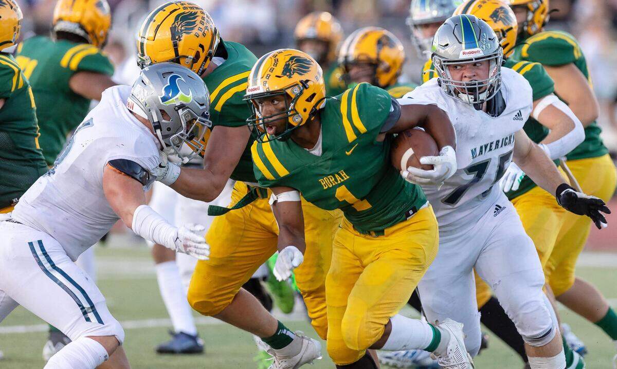 Borah senior Jevon Nelson looks for running room against Mountain View on Sept. 15. Borah and Mountain View open the 5A state playoffs on the road this week.