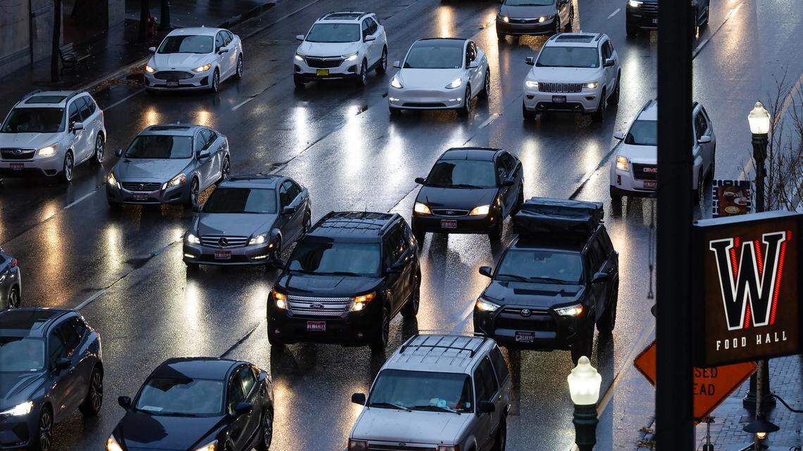 Rain falls on Front Street as vehicles fill the lanes heading west past 8th Street in downtown Boise in 2023.