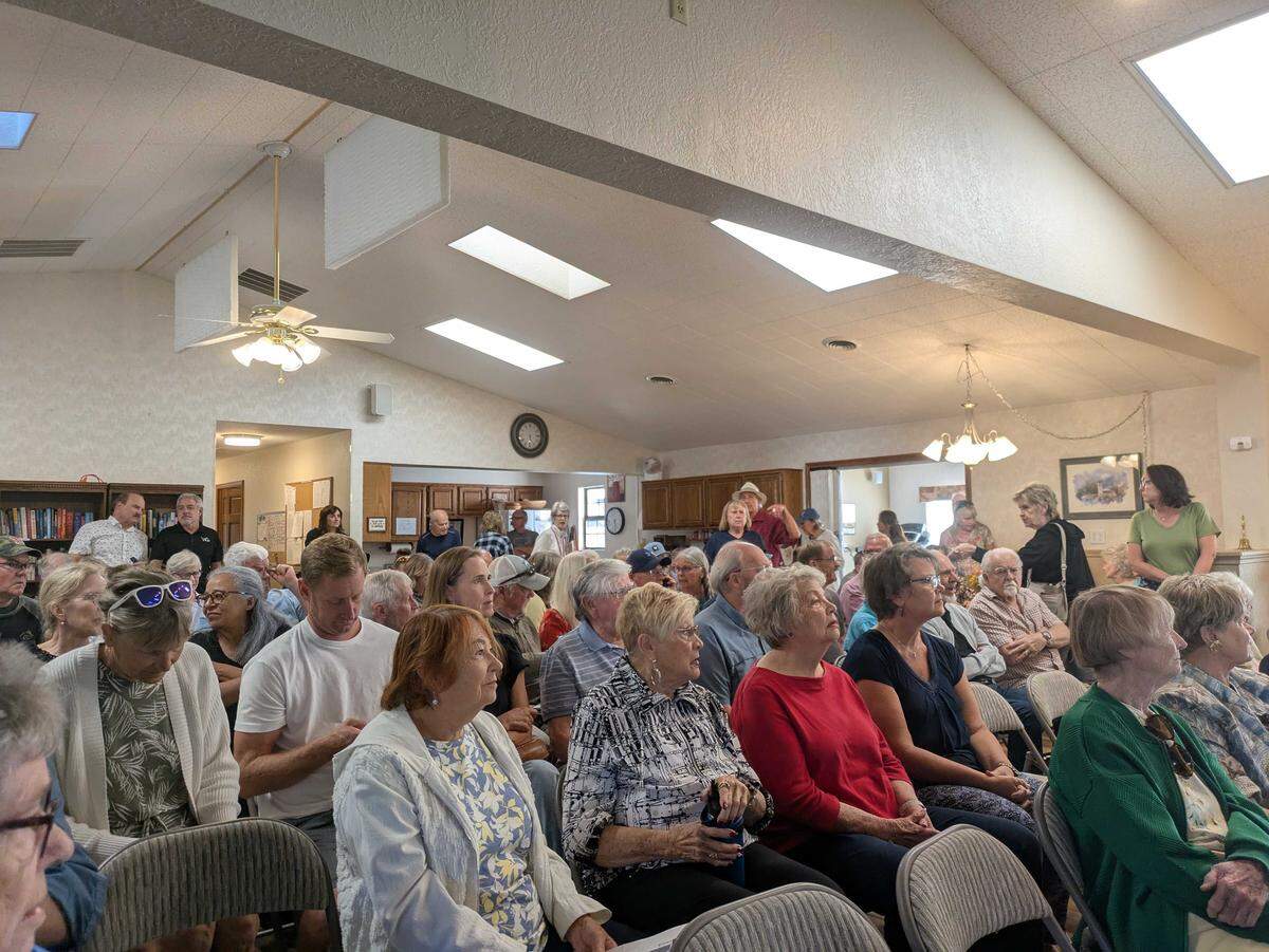 Neighbors came to a meeting at the Willowbrook Clubhouse to discuss a proposed 236-unit apartment complex.
