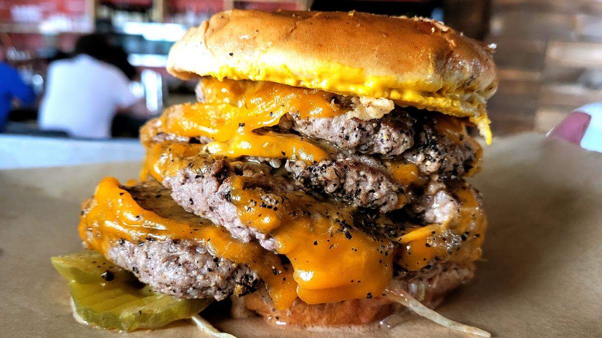 The Double Down with cheese is what owner Dan Watts describes as a “meat feat.”