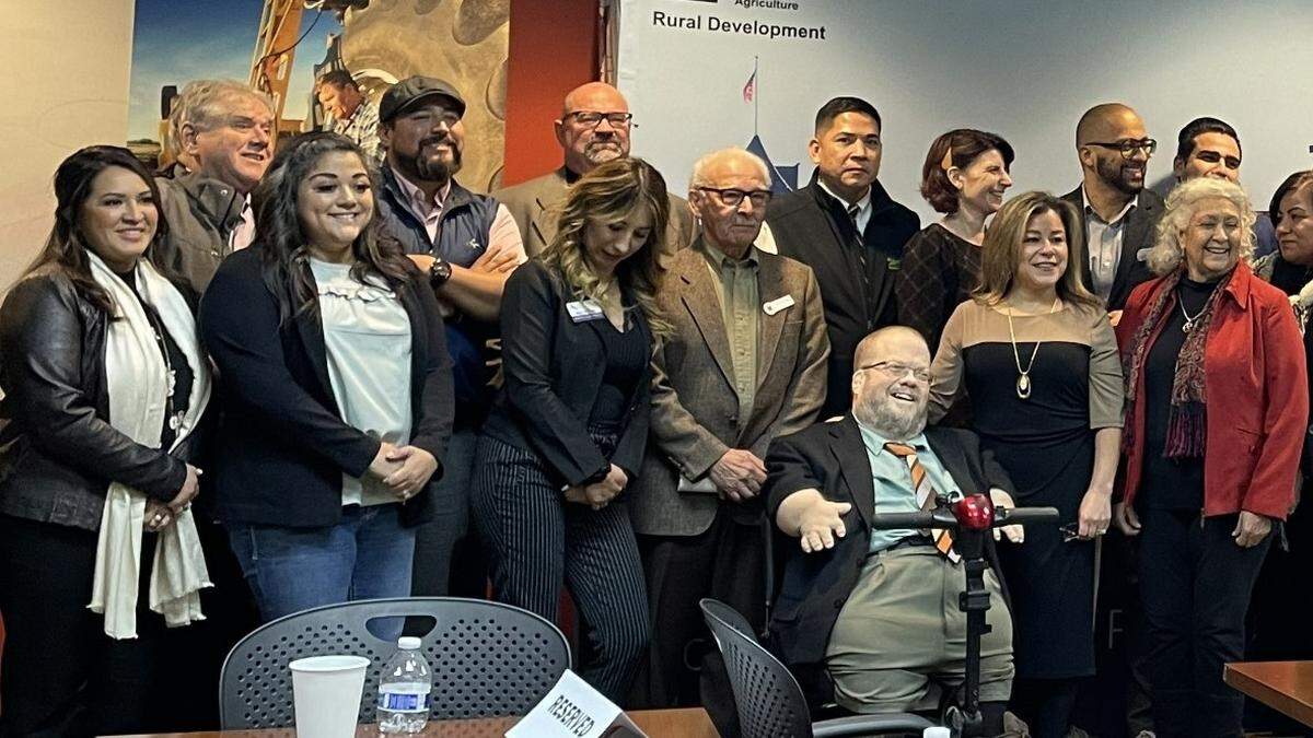About two dozen farmworker and housing advocates and federal officials met in the Hispanic Cultural Center in Nampa for the roundtable. They gathered for a group photo.