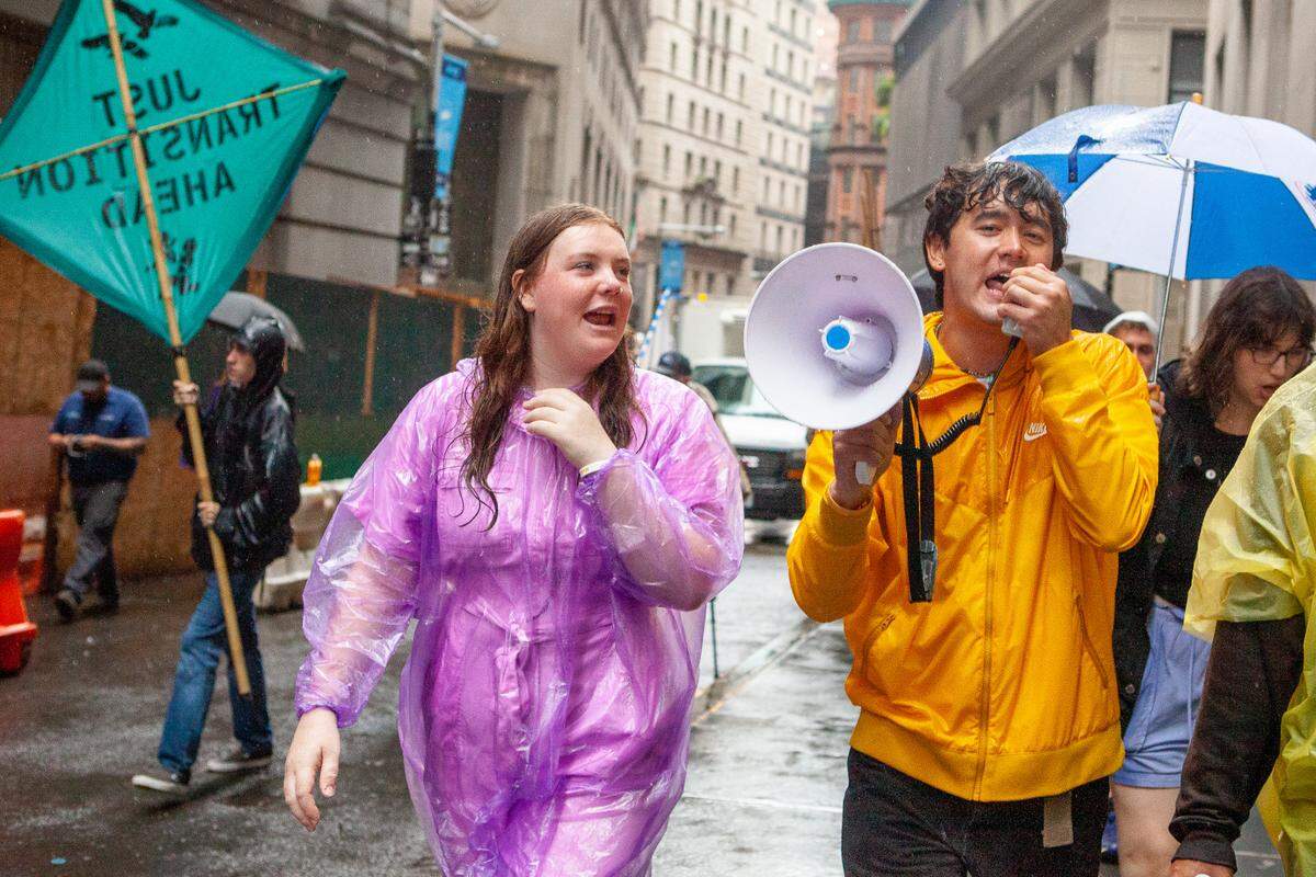 Shiva Rajbhandari, right, is seen at a climate protest in New York City in September.