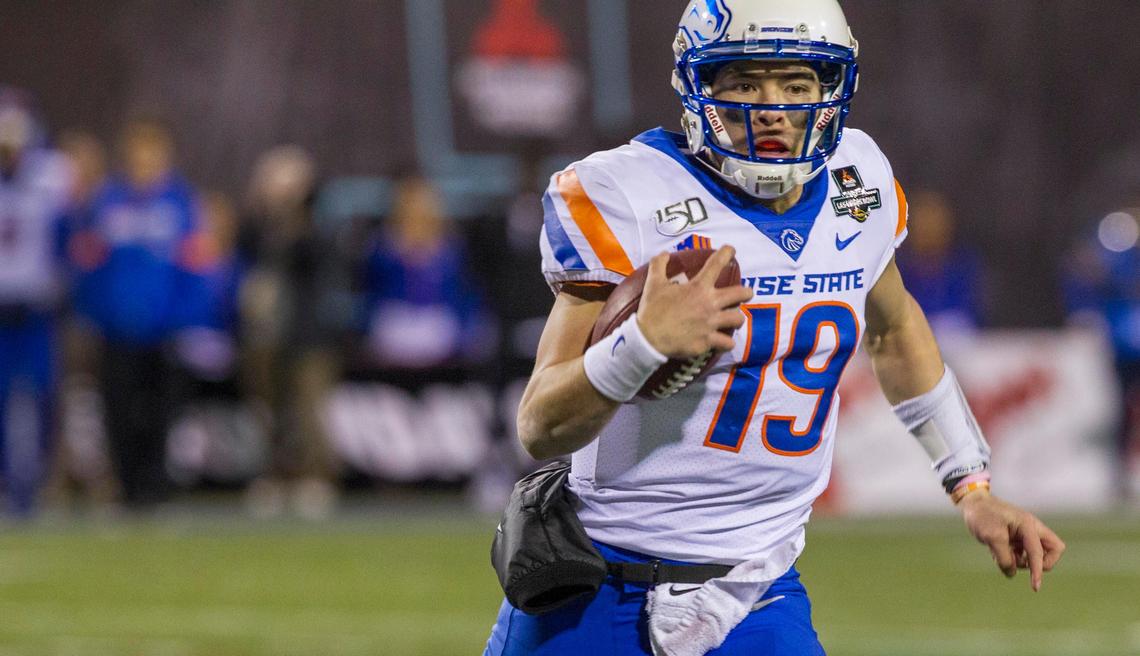 Boise State quarterback Hank Bachmeier runs the ball in the fourth quarter against Washington in the Las Vegas Bowl at Sam Boyd Stadium in Las Vegas, Nevada.