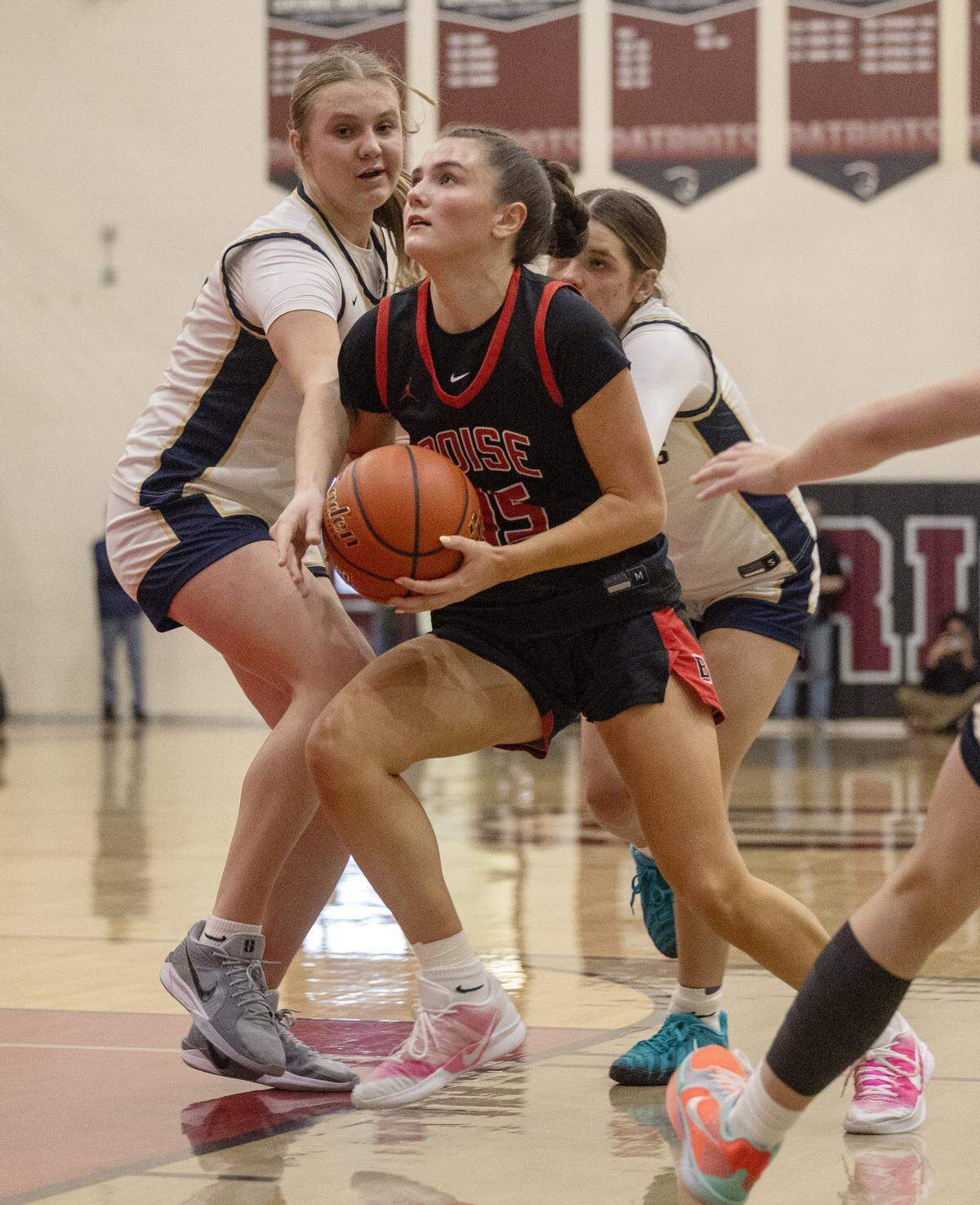 Boise senior Libby Nelson sets up to shoot a basket in their game against Middleton in the semifinals of the 6A District Three girls basketball tournament held at Centennial High School, Saturday, Feb. 7, 2026. Boise won 59-51.