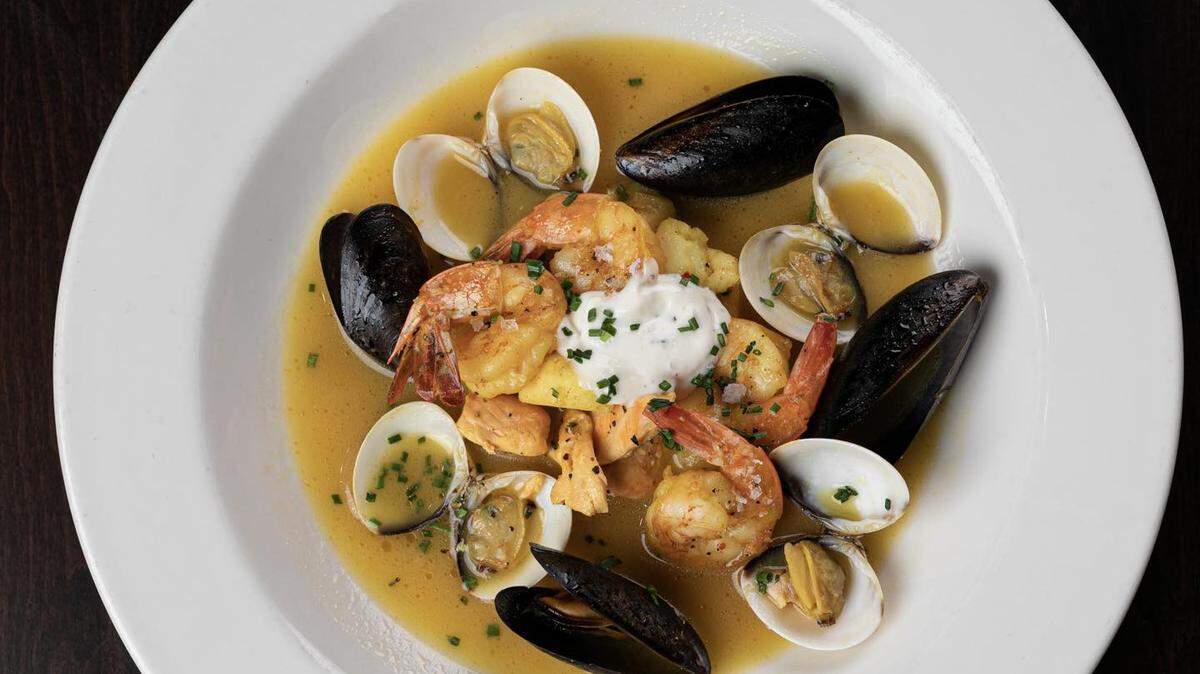 Seared black cod bouillabaisse (normally $39): Fresh seafood in saffron tomato broth with aioli and griddled bread.