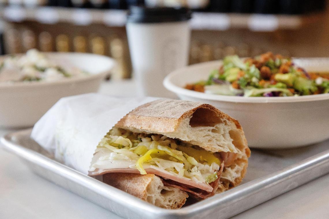 The Gondolier is one of five $12 sandwiches offered at the Roosevelt Market. It comes piled with soppressata, an Italian dry salami, mortadella pork sausage, smoked ham, provolone cheese, olive spread and pepperoncini. It’s packed inside a crispy ciabatta roll from Acme Bakeshop.