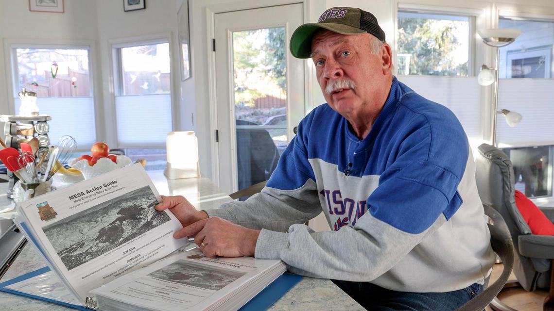 Rod Haars refers to an emergency plan outline provided to homeowners through the Mesa neighborhood’s emergency preparedness program.