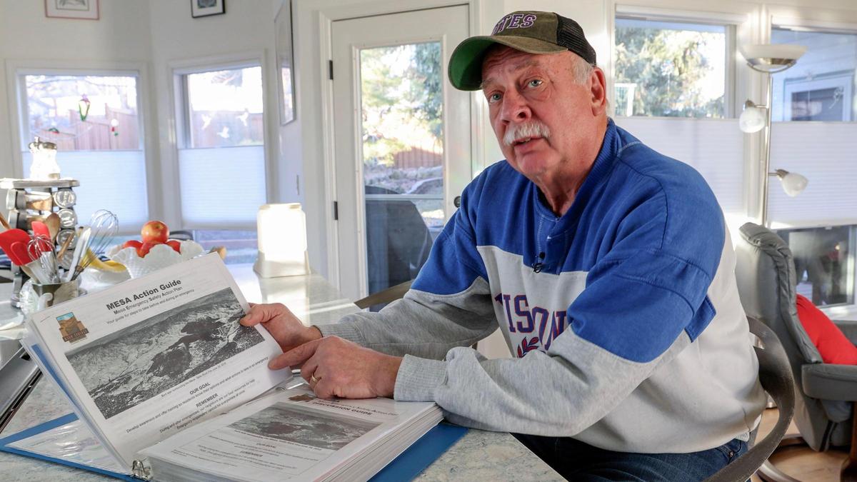 Rod Haars refers to an emergency plan outline provided to homeowners through the Mesa neighborhood’s emergency preparedness program.