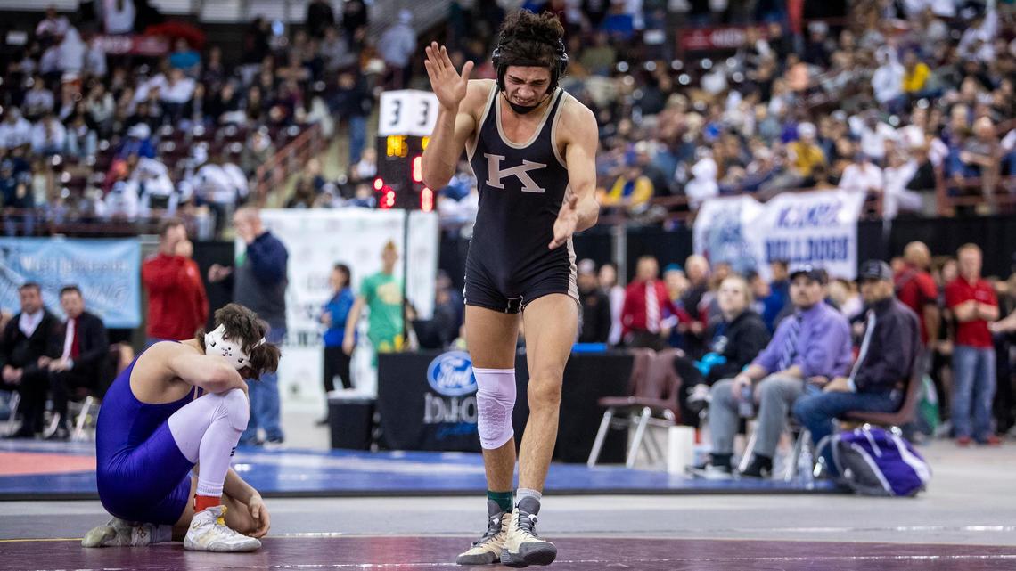 Kuna’s Dante Roggio celebrates winning the 4A 138-pound state wrestling championship against Canyon Mansfield from Century Saturday at the Ford Idaho Center in Nampa. Kuna also repeated as the 4A team champion as well.