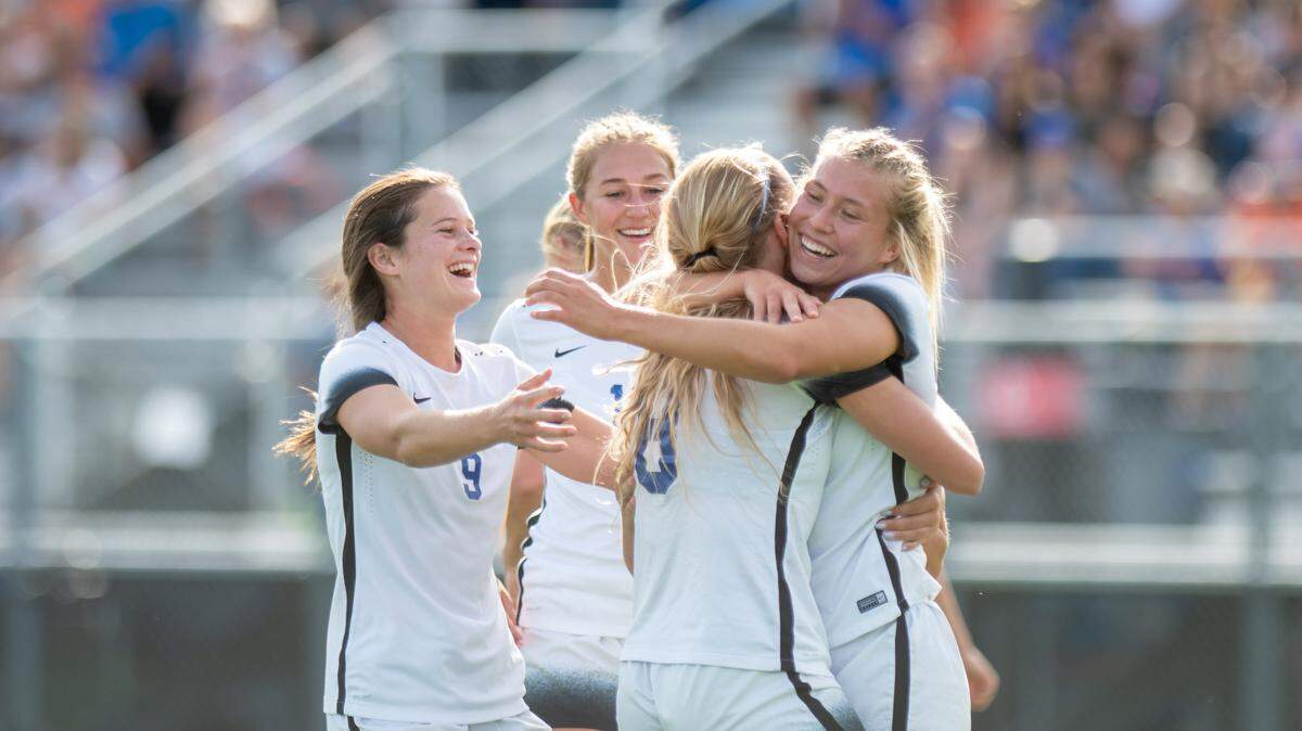 McKenna Kynett, far right, celebrates with Boise State teammates during their 2-1 win over Nevada on Friday at the Boas Soccer Complex in Boise, Kynett scored both goals for the Broncos.