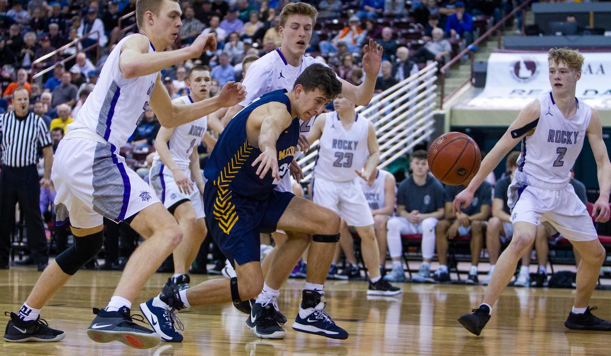 Meridian senior Jordan Pearce hustles to get a loose ball in the first round of the 5A state tournament Thursday at the Ford Idaho Center.