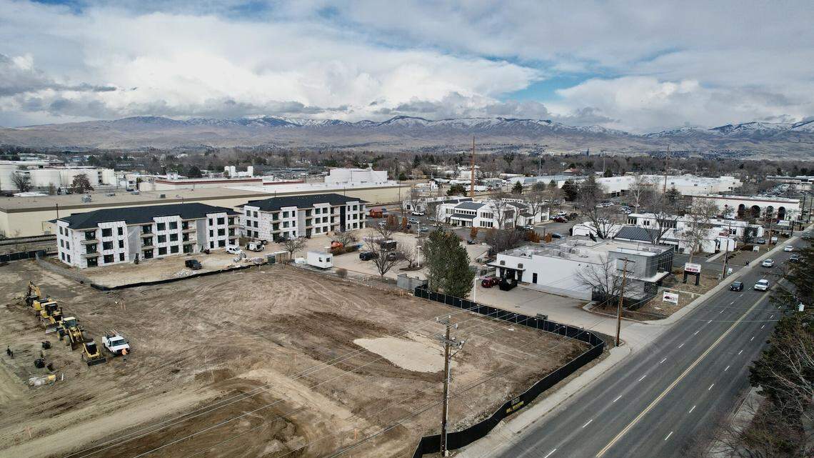 An aerial view of the Franklin Apartments under construction on the Boise Bench, looking northeast. The former Crescent “No Lawyers” Bar and Grill building is at right, along Franklin Road.