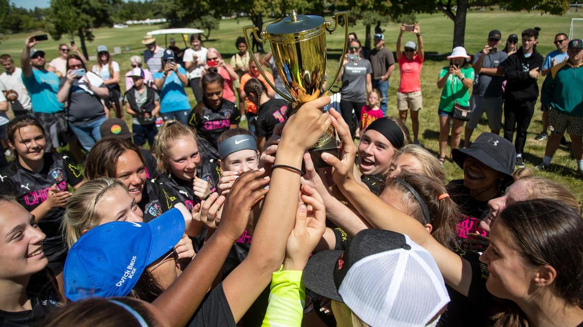 The U-15 Indie Chicas raise their Idaho State Cup championship trophy Monday after defeating the Boise Thorns 2-1 at Simplot Sports Complex in East Boise.