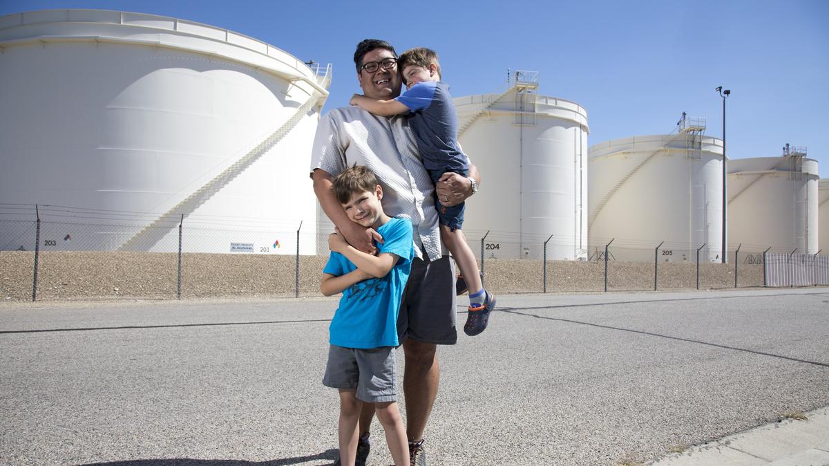 If the tank farm at Morris Hill Road and Phillippi Street were to move, Randy Johnson, president of the Central Bench Neighborhood Association (with his sons, Oliver, left, 7, and Quincy, 4), says the association would like to help guide the transformation of an industrial park into a residential, neighborhood-focused area.