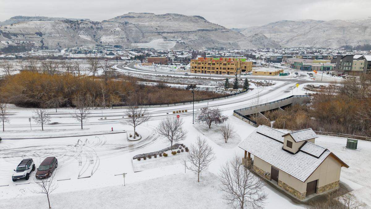 Snow covers the ground near Warm Springs Avenue on Wednesday morning.