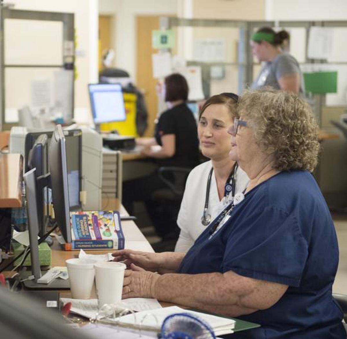 Employees go about their business July 17 at North Canyon Medical Center in Gooding.
