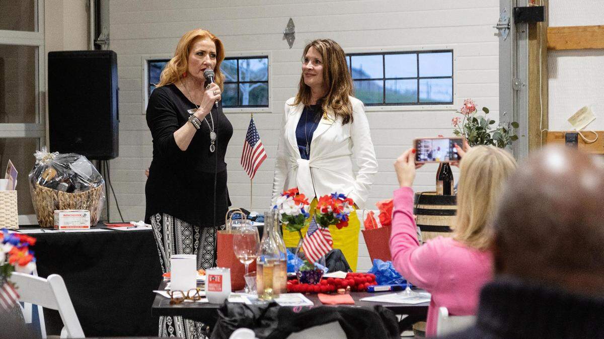 Idaho GOP vice chair Machele Hamilton, left, and Idaho Lt. Gov. Janice McGeachin, appear during a campaign fundraiser in Caldwell on April 21, 2022. McGeachin seeks to raise the salary of Hamilton, her office’s lone staffer.