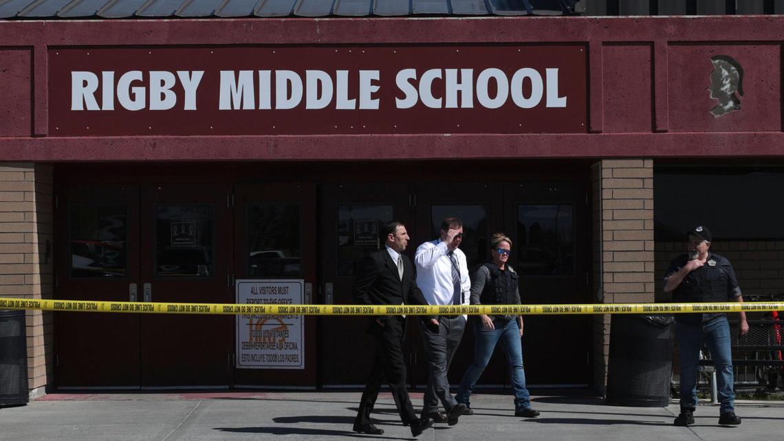 Officers leave Rigby Middle School after a shooting there on May 6, 2021.