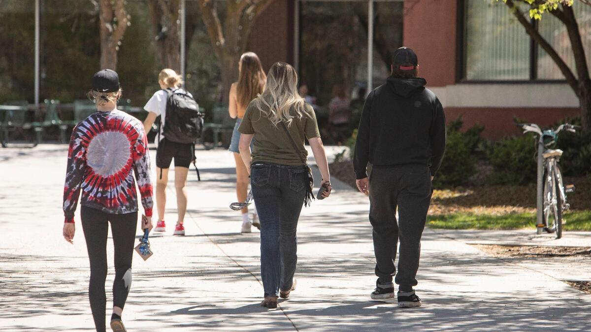 Students walk between buildings at Boise State University in 2021. BSU has closed its Gender Equity and Student Equity centers.