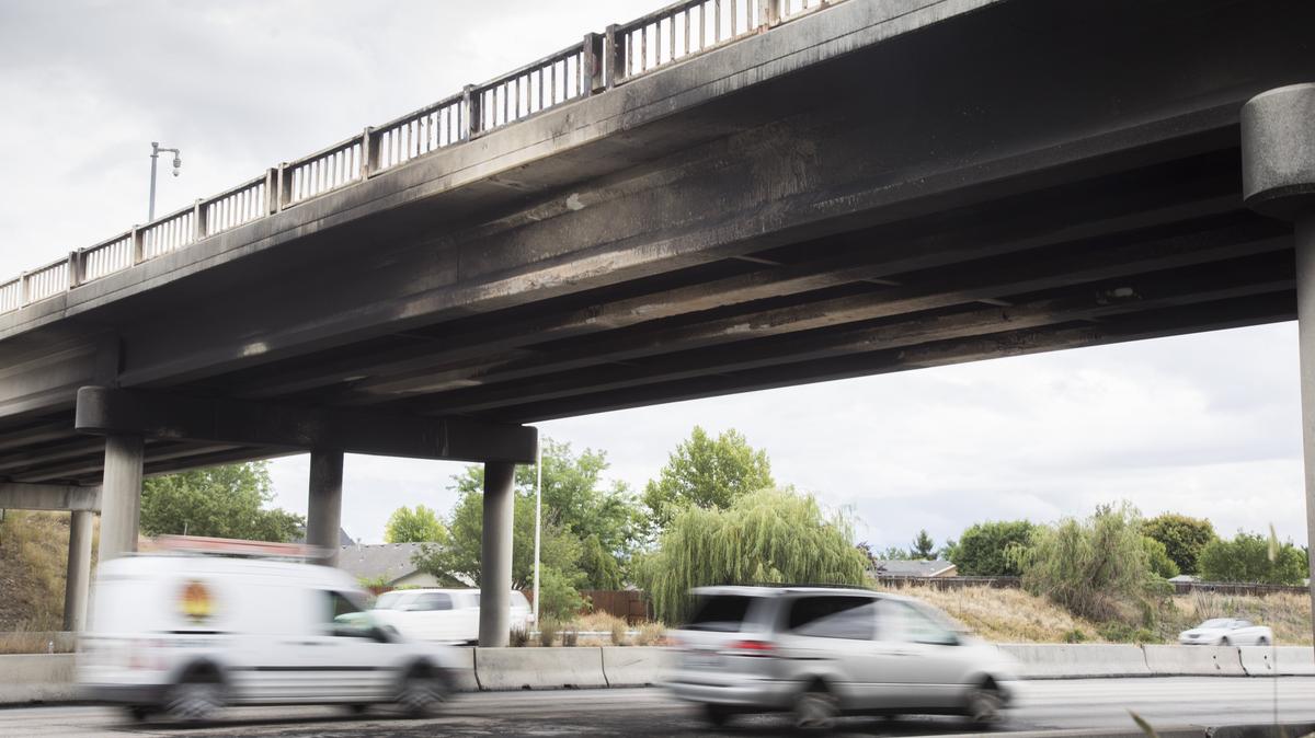 Blackened portions of the Cloverdale overpass are sooty but mostly undamaged by the fire caused by the June 16 crash on I-84 under the overpass that killed four people. Pink and white coloration indicates serious heat damage. The Idaho Transportation Department plans to replace the two-lane bridge with one that has four lanes, bike lanes and sidewalks. Ada County Highway District plans to widen Cloverdale Road on the north and south sides of the overpass.