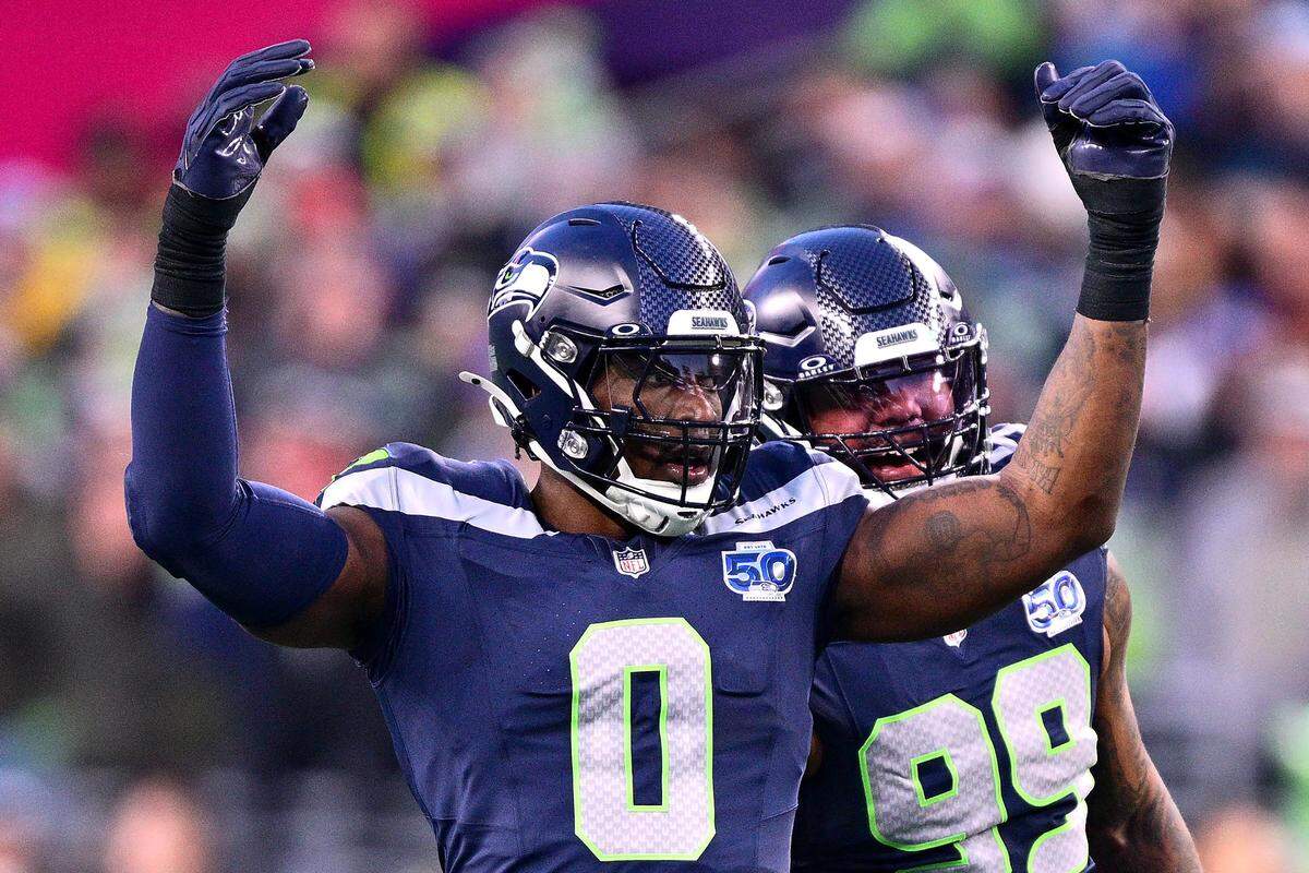 Seattle’s DeMarcus Lawrence celebrates a sack against the Los Angeles Rams in the NFC championship game at Lumen Field in Seattle.