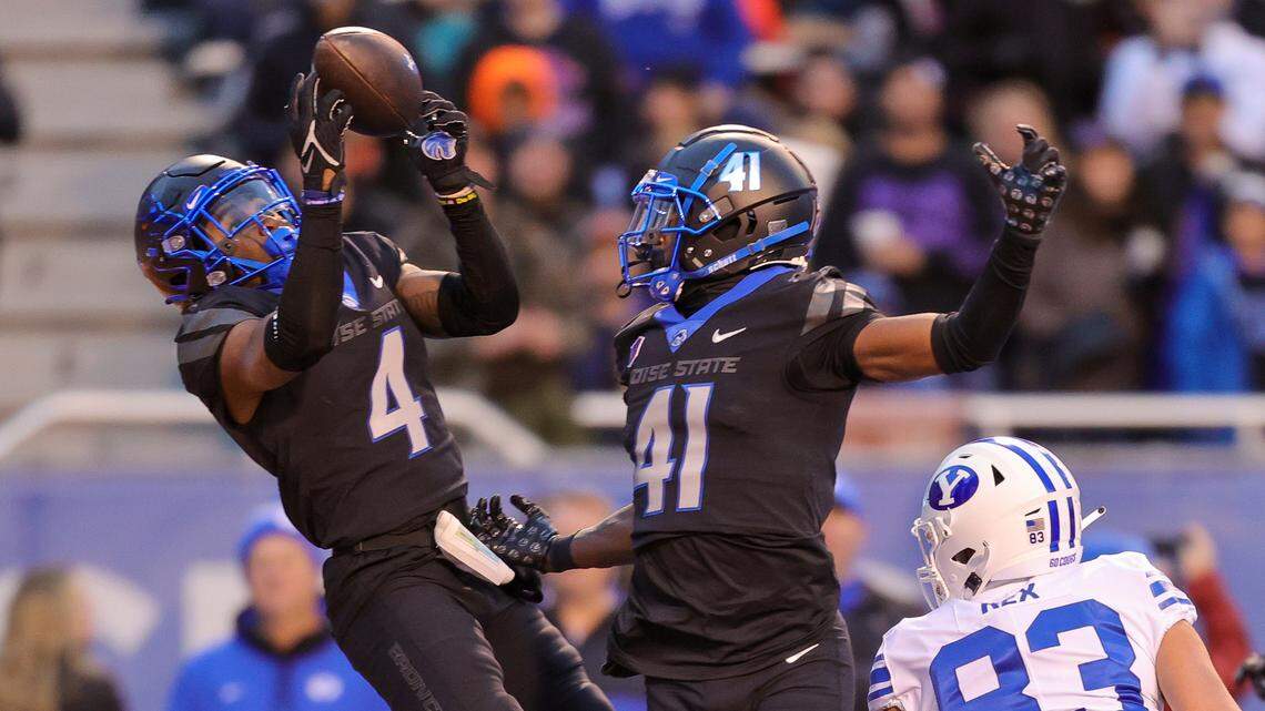 Boise State safety Rodney Robinson (4) intercepts a pass during the Broncos’ loss to BYU last season. Robinson started 13 games last fall and finished second on the team with three interceptions.