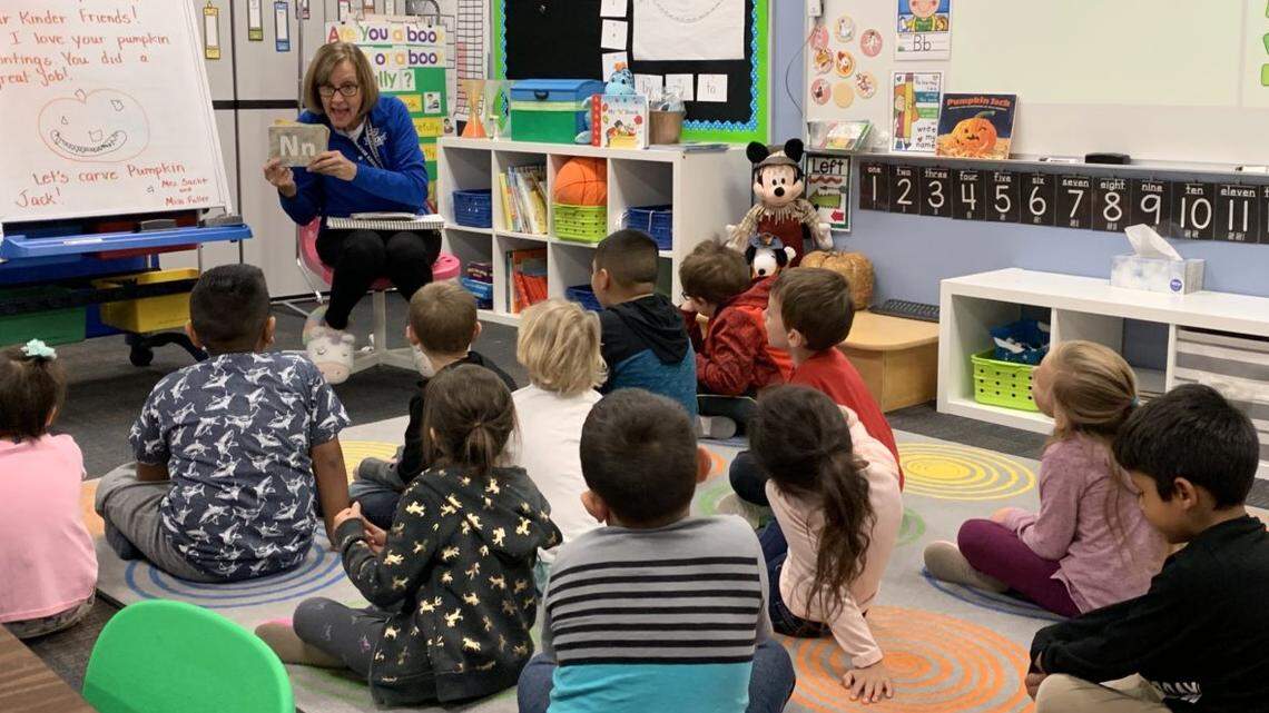 Notus Elementary School teacher DA Sacht works with kindergartners on a letters drill. Boise School District’s Board of Trustees will move forward with plans to offer optional full-day kindergarten to all students next year.
