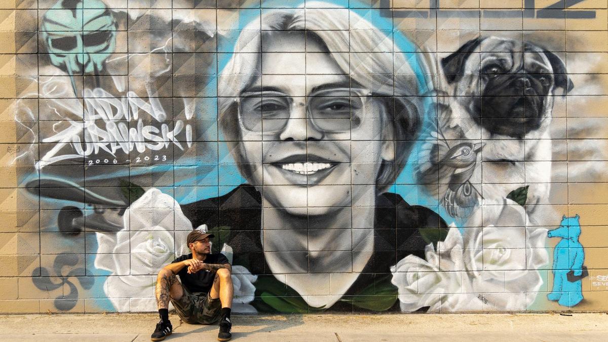 “It’s just a good reminder for us all to slow down and be aware of our surroundings, and be conscious of each other,“ said mural artist Hawk Sahlein just a few days after a grim anniversary. Sixteen-year-old Jadin Zurawski was struck and killed by a vehicle while riding his skateboard across the intersection at 16th and Washington streets on his way to Boise High School.