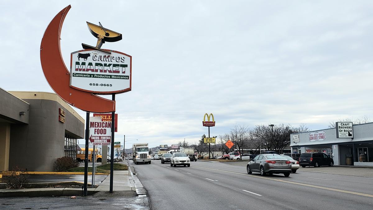The road sign for Campos Market on North Orchard Street includes the crescent moon and the martini glass used by the former tenant, the Crescent Bar, now located on Emerald Street and known as the Crescent No-Lawyers Bar-Grill.