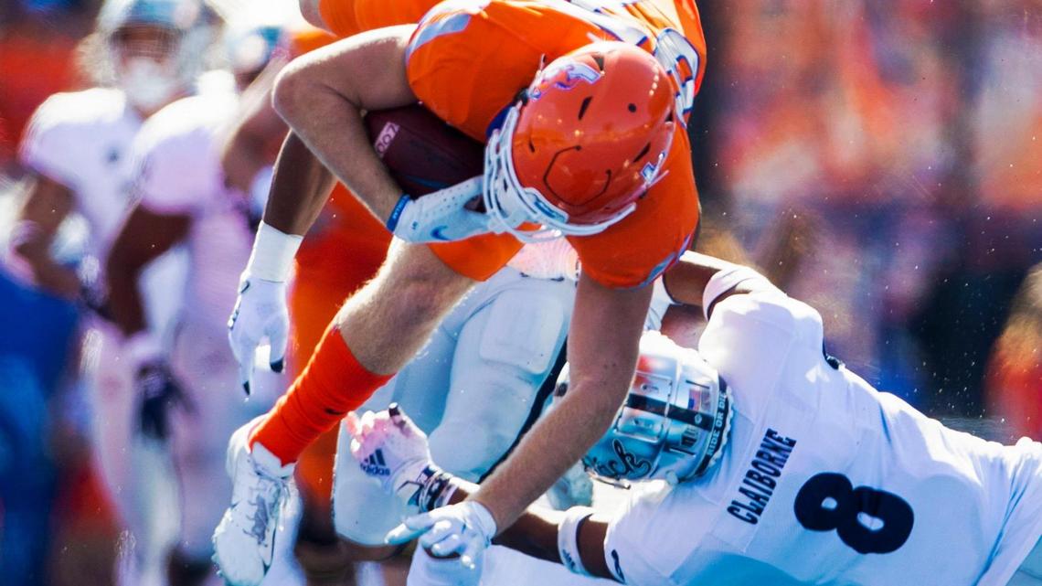 Boise State tight end Kurt Rafdal tries to escape a Nevada tackle in the first half of the Broncos’ 41-31 loss to the Wolf Pack in 2021 at Albertsons Stadium in Boise.
