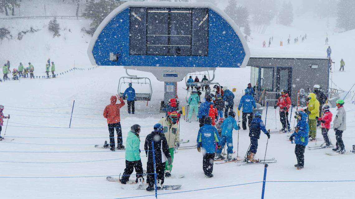 Skiers and snowboards gather at the Morning Star Express chairlift terminal at Bogus Basin. Additional chairs will be installed on this and the Superior chairlift, increasing uphill capacity by 30%, according to Bogus officials.