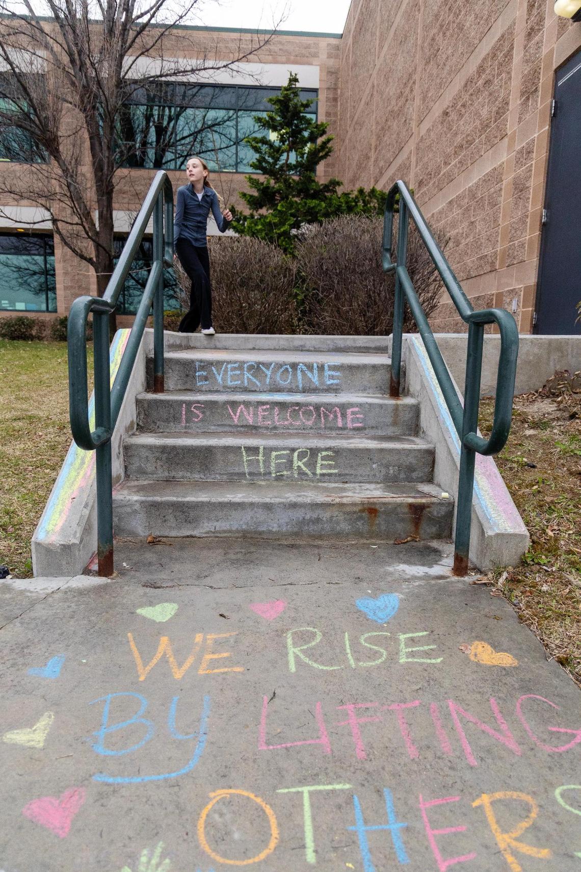 The district said Sarah Inama’s signs violate school policy.