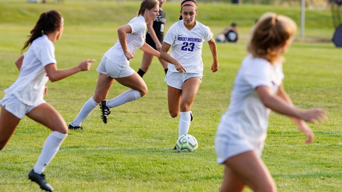 Rocky Mountain High’s Nadia Kincaid charges forward with the ball during a soccer match against Bishop Kelly on Tuesday at Bishop Kelly High.