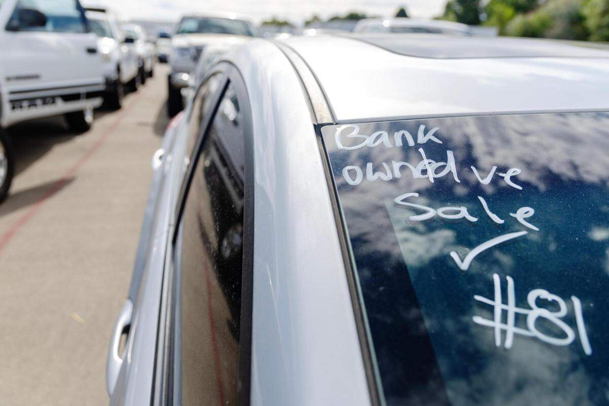 Bank-owned cars, like this one, make up many of the vehicles in the auction's lot. 