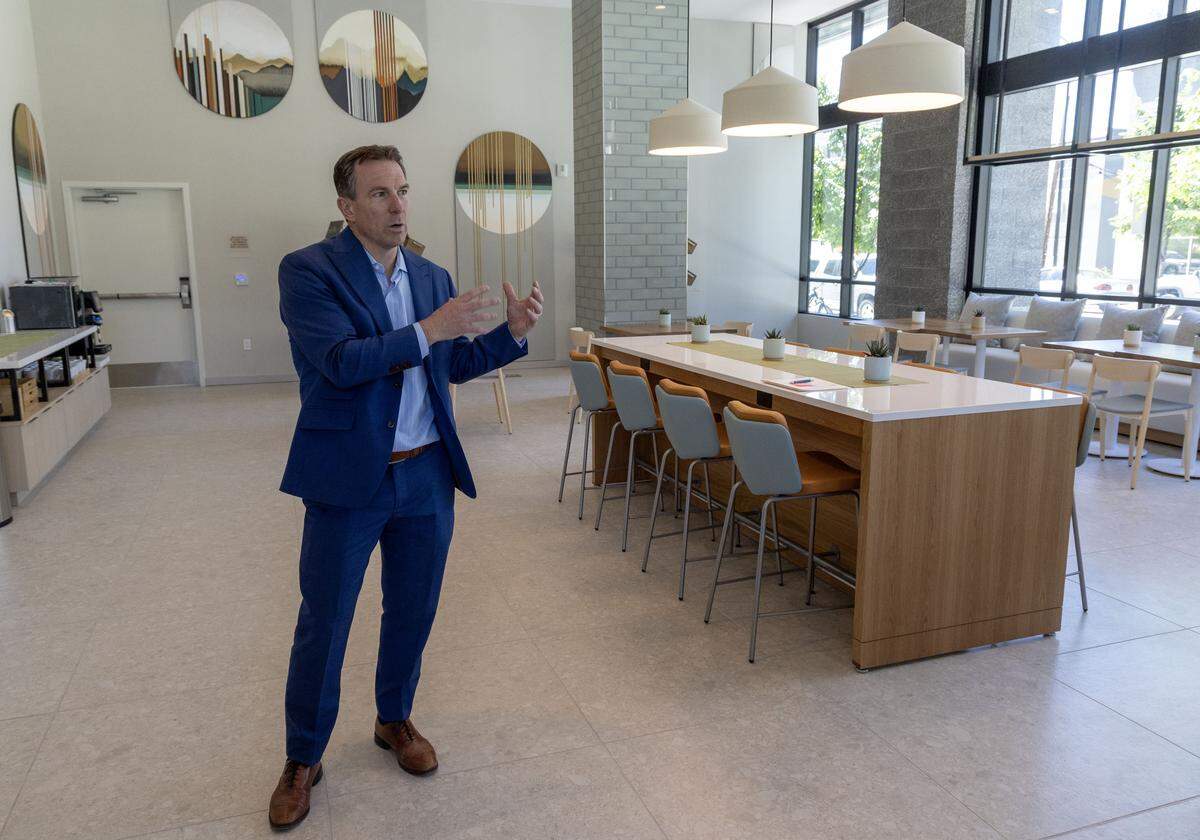 Jared Smith, co-founder of Eagle-based Pennbridge Hospitality, describes the breakfast dining area of the Element side of the AC/Element Hotel in downtown Boise. Monday, May 11, 2026.