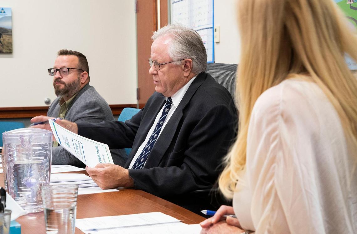 Ada County Commissioners Rod Beck, center, Ryan Davidson and Kendra Kenyon interview candidates to fill a position on Central District Health Board of Health Monday, Aug. 9, 2021 at the Ada County Courthouse in Boise.