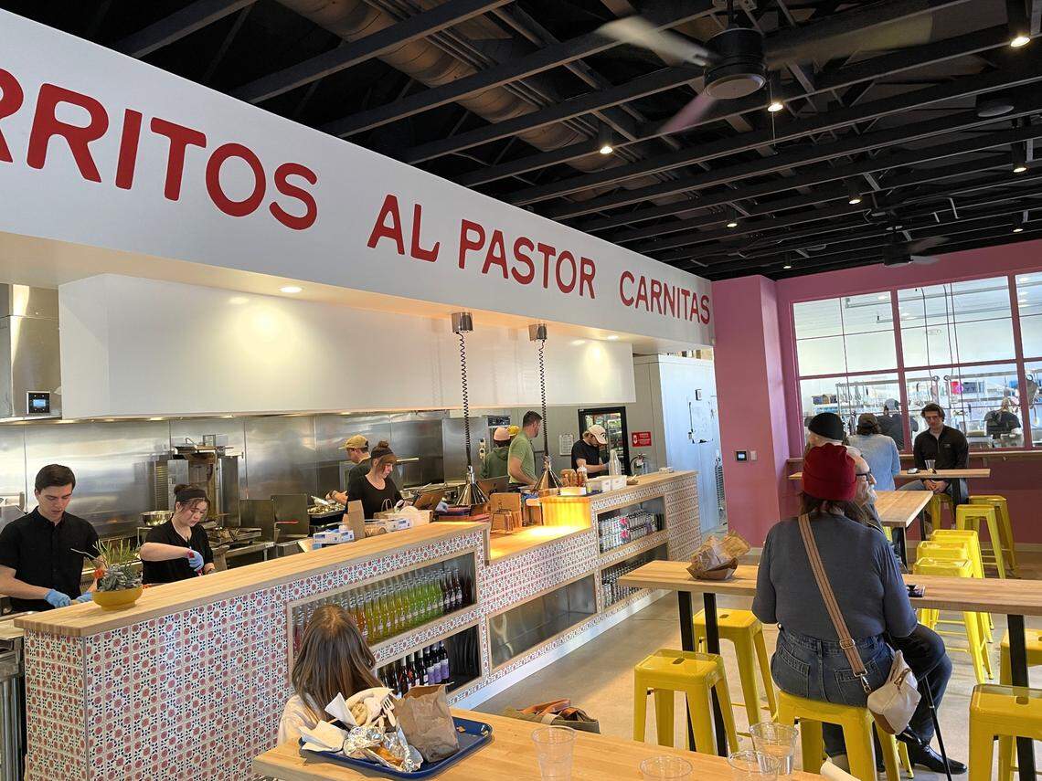 The kitchen area is wide open inside the restaurant.