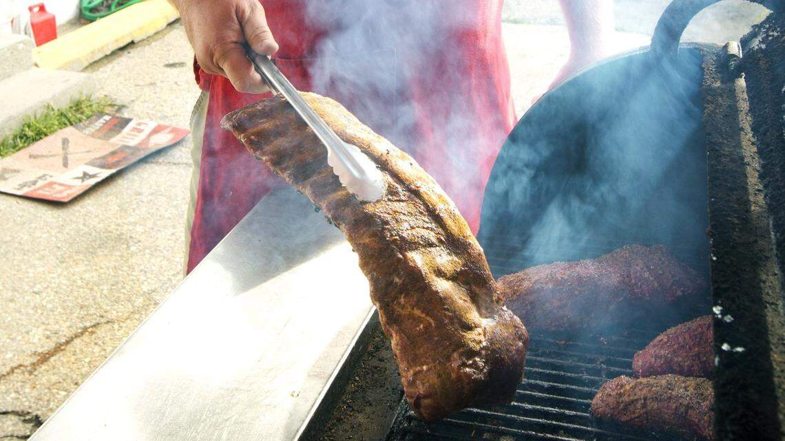 Steve Kubinski cooks up racks of ribs and other deliciousness at Big K BBQ at 3409 W. Chinden Blvd.