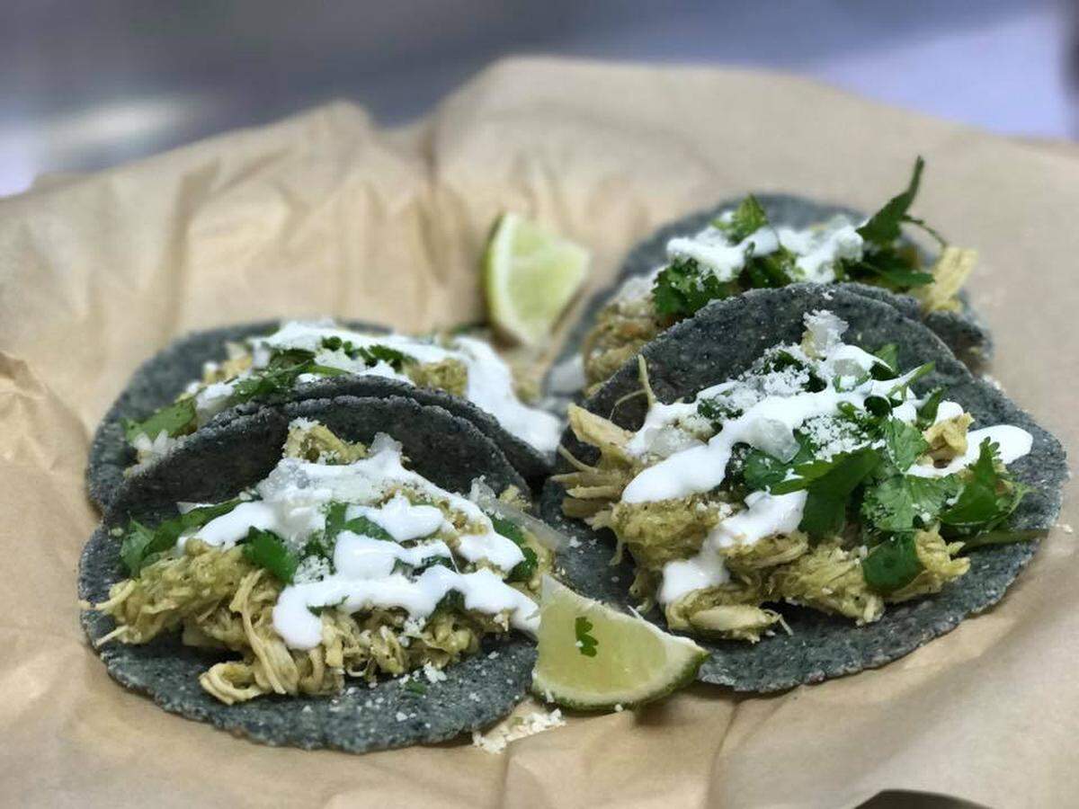 Bluwave's signature tacos are wrapped in handmade, blue corn tortillas.