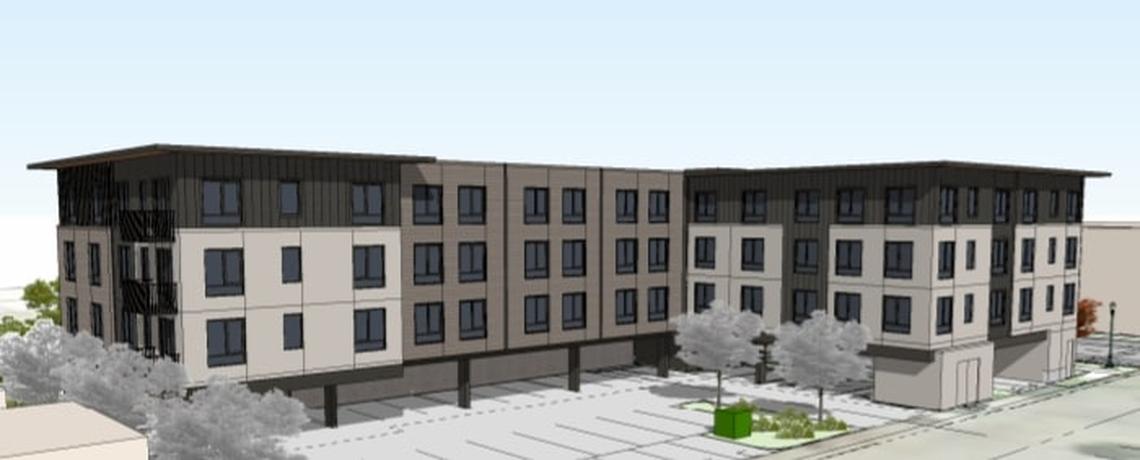 A rendering of a more than 34,000-square-foot building proposed at the corner of West Lee Street and 11th Street with 54 multi-family units and office space on the ground floor.