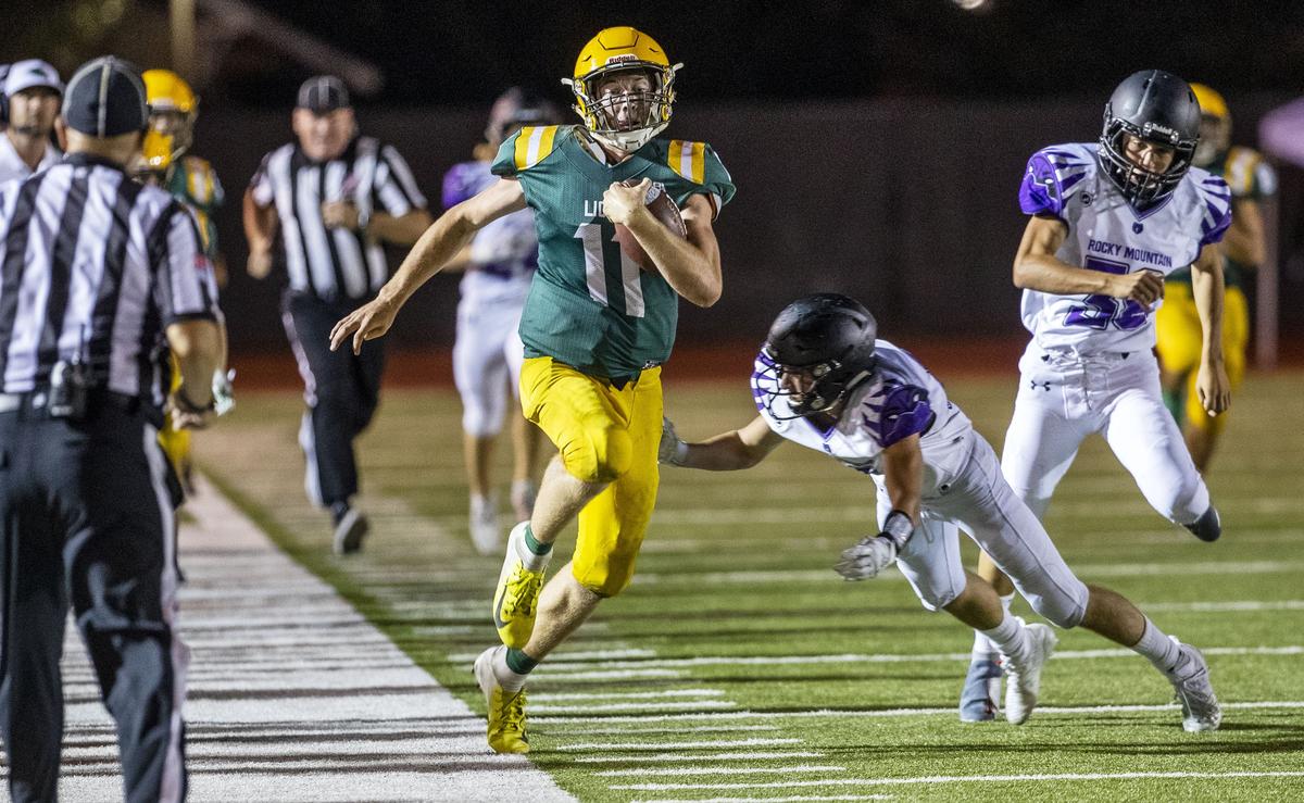 Borah senior Austin Bolt tip toes down the sideline as Rocky Mountain’s Trevor Van Gerpen forces him out on a 49-yard kickoff return in the fourth quarter Thursday, Aug. 29 at Dona Larsen Park in Boise.