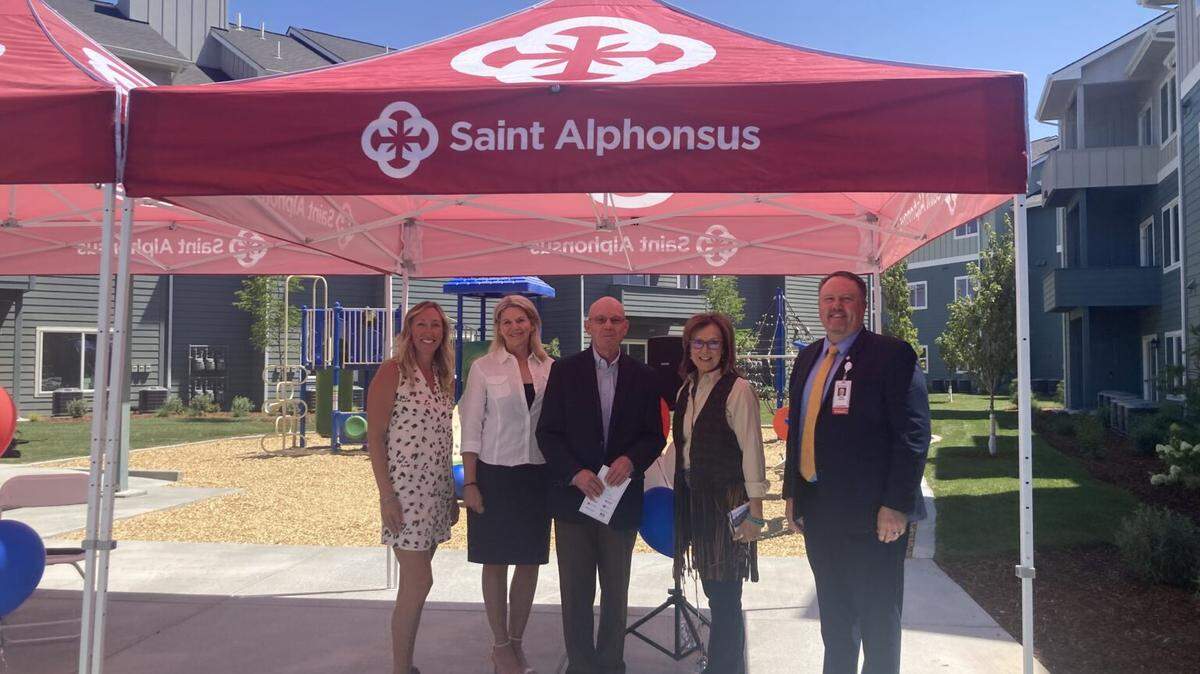Community partners contributed funds to build affordable housing units for the Canyon Terrace Apartments in Nampa. From left to right are Heidi Rahn from the Nampa School District, Kathryn Almberg from The Housing Company, Gerald Hunter from the Idaho Housing and Finance Association, Nampa Mayor Debbie Kling and Travis P. Leach from Saint Alphonsus.