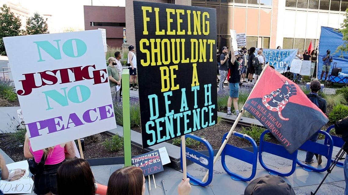 Police accountability advocates in front of Boise City Hall protested the fatal shooting of Payton Wasson by Boise police in June 2023. An outside prosecutor won’t pursue charges against the officer who shot and killed the 22-year-old.