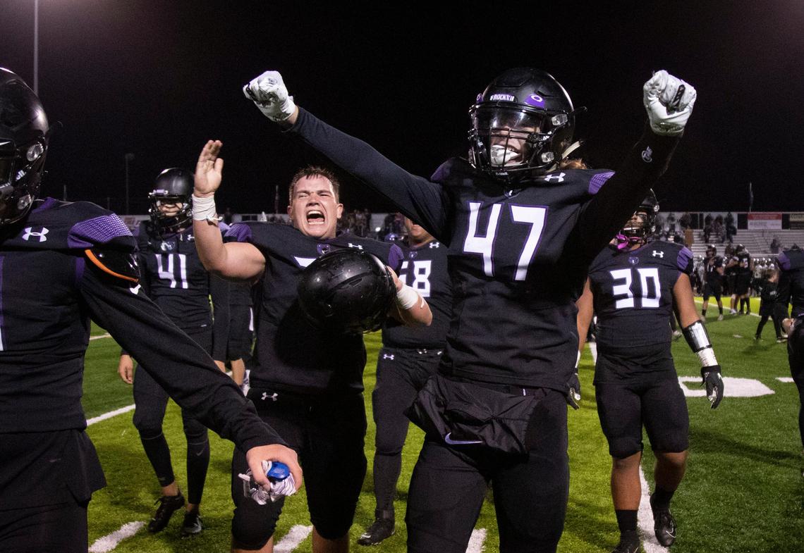 Kevin Croft, left, and Austin Edwards (47) celebrate as No. 1-ranked Rocky Mountain remains undefeated after a 19-13 win in overtime against Eagle on Friday.