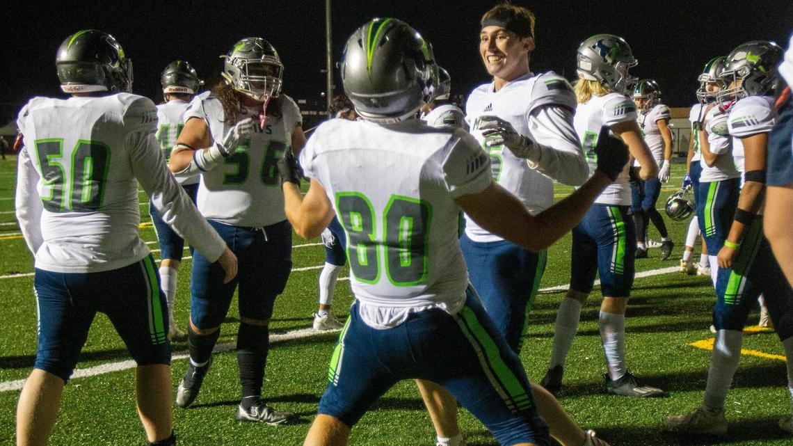 Mountain View celebrates its 21-14 win over Capital in the 5A state quarterfinals Friday at East Junior High. The Mavericks advance to face Rigby in the semifinals next week.