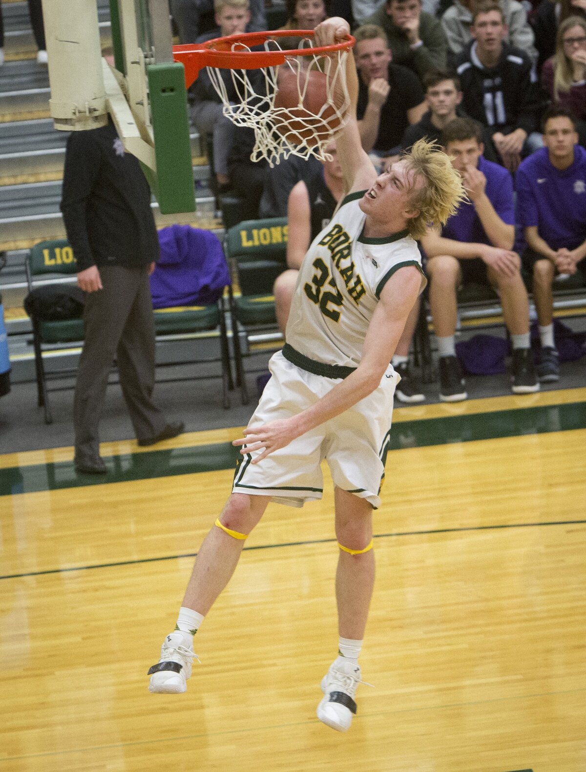 Borah junior Austin Bolt breaks away for a dunk in the Lions’ 48-46 win over Rocky Mountain on Jan. 30.